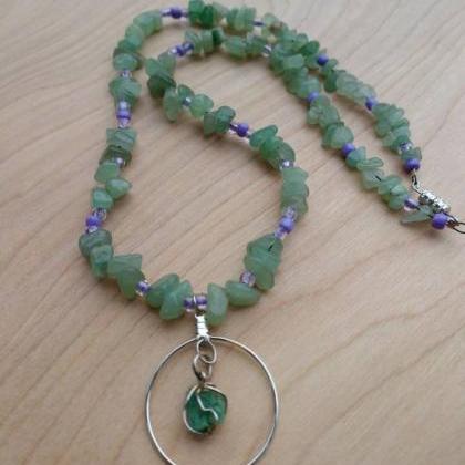 Handcrafted gemstone and glass bead..