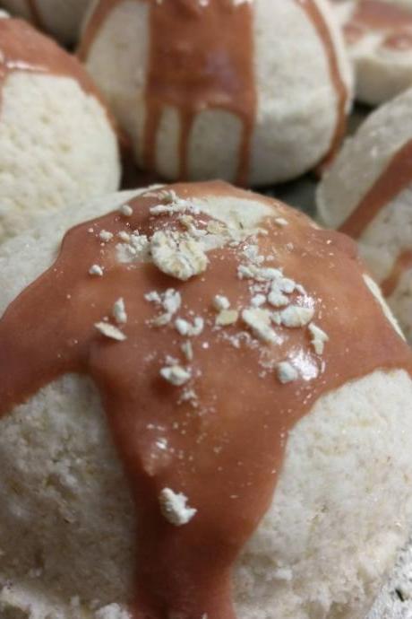Milk and honey oatmeal bath bombs with drizzle